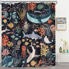 a shower curtain with an underwater scene on it