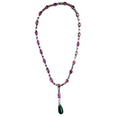 A classic Pink Sapphire and Diamond baguette necklace, with a detachable hanging Emerald drop locket - all set in 18K white gold. Stone Details: Pink Sapphire - 34.96 carats Zambian Emerald Drop - 17.22 carats Diamond - 8.8 carats , VS/H,I The necklace can be certified upon request. Art Deco Emerald, Baguette Necklace, Necklace Art Deco, Diamond Baguette, Necklace Art, Dark Feminine Aesthetic, Zambian Emerald, Gold Stone, Feminine Aesthetic