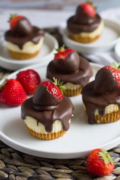 chocolate covered cupcakes with strawberries on the side