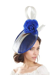 Royal Cobalt Blue Silver Gray Statement Hatinator Womens Kentucky Derby Hats Wedding Royal Ascot Fascinator Headpiece Custom Tea Ladies Day Hats By Cressida Kentucky Derby & Ascot Fascinator Hats Laiken Royal Blue and Silver Fascinator Hat Pretty silver silk abaca swirl trimmed with royal blue silk rose Base measures 10 inches wide.  This royal blue and silver headpiece is mounted with a matching headband. If you prefer a headband to match your hair, please make a note at check out what colour h Royal Blue Adjustable Fascinator For Wedding, Blue Mini Hat For Royal Ascot Wedding, Royal Blue Mini Hats For Royal Ascot Races, Blue Royal Style Wedding Hat, Blue Curved Brim Mini Hat For Wedding, Elegant Royal Blue Mini Hats For Wedding, Royal Blue Fascinator For Royal Ascot Wedding, Royal Blue Fascinator For Wedding And Royal Ascot, Royal Blue Mini Hats For Kentucky Derby Wedding