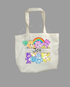 This reusable tote is perfect for little ones to carry around. Designs are added by sublimation method, so not peeling or cracking of the image. Tote is machine washable. This tote is 13.5" x 13.5" x 4" (34.2cm x 34.2cm x 10.1cm). White School Bag With Character Print, Personalized White Canvas Bag For School, White Reusable School Bag, White Canvas Bag For School, Personalized Tote Bags, Care Bears, Reusable Tote, Bears, Tote Bag