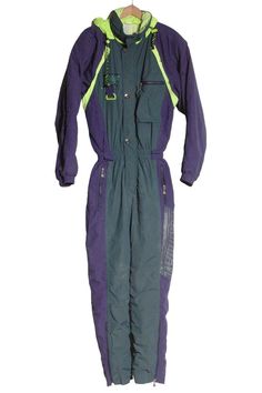 Vintage Luhta Northwave ski suit from the 1990's. Green, purple and neon green in colour. Zip front concealed by press stud fastenings. Three front pockets. Elasticated waist and cuffs. Made in Finland from a cotton nylon fabric with padded polyester inside lining. Label reads GB 40. Condition: Excellent vintage condition. Chest: 44in Length: 64in Waist: 30-34in Inside sleeve: 22in Inside leg: 32in More vintage clothing on our website www,brickvintage.com Purple And Neon Green, Ski Suit, Ski Suits, Press Studs, Neon Green, Vintage Clothing, Finland, Skiing, Vintage Outfits