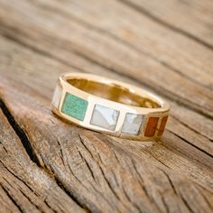 a close up of a ring on a wooden surface