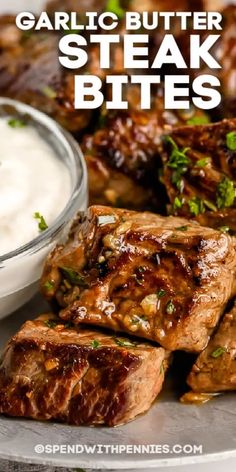 garlic butter steak bites on a plate with ranch dip