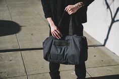 Go Duffel - Heathered Black — Aer | Modern gym bags, travel backpacks and laptop backpacks designed for city travel Versatile Duffle Bag With Functional Pockets For On-the-go, Sporty Nylon Travel Bag For On-the-go, Functional Travel Accessories With Pockets For On-the-go, Functional Weekender Bag With Pockets For On-the-go, Nylon Travel Bag With Pockets For On-the-go, Functional Travel Bag With Zipper Pocket For On-the-go, Versatile Duffle Bag With Functional Pockets For Everyday, Versatile Everyday Duffle Bag With Functional Pockets, Functional On-the-go Travel Bag With Zipper Pocket