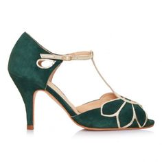 A beautiful vintage-inspired peep toe t-bar shoe handcrafted from rich forest green suede, Mimosa features a gorgeous oversized petal design at the front of the shoe with contrasting gold metallic leather edging underneath. Complete the look with the matching Coco clutch bag in gold metallic leather.   Sizing information? This style fits fairly true to size however if you're between sizes, we recommend ordering the smaller size.   Colour: Forest Green Material: Suede, Leather Heel Height: 8cm Sh Comfortable Bridal Shoes, Rachel Simpson, Beautiful Wedding Shoes, Bridal Handbags, T Bar Shoes, Green Heels, Occasion Shoes, Green Suede, Shoe Clips