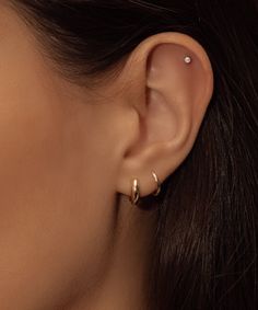 Truly perfect in any piercing location. These studs brighten your face and elevate your ears. Safe for sensitive skin, our pieces are hand crafted and made to wear 24/7. 14k gold filled. Sold as a pair. Available in 2 sizes: tiny 2mm & standard 3mm. Diamond replica AAA cubic zirconia. Hair Cuffs, Chain Anklet, Single Earring, White Rose Gold, White Rose, Ring Bracelet, White Roses, Snug Fit, Anklets