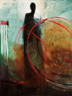 an abstract painting with red circles in the foreground and a man standing behind it