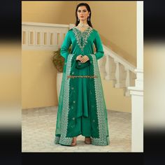 A Breathtakingly Beautiful Ensemble From Vanya. Pk Fabric: Korean Silk Dupatta Fabric: Organza Chest Size: 40" Color: Green Festive V-neck Dress With Dabka Work, Festive V-neck Dresses With Sheer Dupatta, Eid Dresses With Zari Work And V-neck, Eid V-neck Dress With Zari Work, Eid Anarkali V-neck Dress, Semi-stitched V-neck Dress For Eid, Elegant Green Gown With Dabka Detailing, Eid V-neck Semi-stitched Dress, Elegant Green Gown With Dabka Embroidery