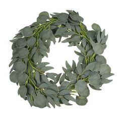 a wreath made out of green leaves on a white background