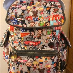 Nwt Tokidoki Vivace Backpack Americana “Rare,Retired". Main Drawstring Closure With Flap. Two Exterior Side Pockets, Magnetic Closure Snaps. Front Zipper Pocket, Interior Back Panel Organizer Pockets. Roomy & Lightweight. Adjustable Shoulder Straps 20-29”.Dimensions 17 X 11 X 6.5” Cute Handbags, Vera Bradley Backpack, Magnetic Closure, Front Zipper, Shoulder Straps, Zipper Pocket, Bag Lady, Purse, Backpacks