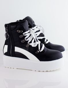 Our LOUVER platforms are a high ankle black shoe with a white platform and white laces. Platform height: 2.5" Imported. Dollskill Shoes, High Platform Shoes, Dr Shoes, Fashion Shoes Heels, Kawaii Shoes, Black Shoe, Black And White Shoes, White Platform, Dream Shoes