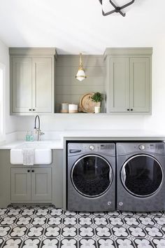 a washer and dryer in a small room