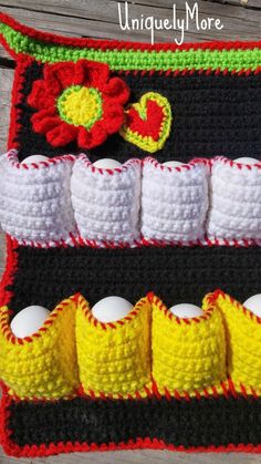 a crocheted bag with eggs in it