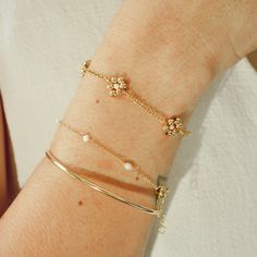 Elevate your style with our chic Daisy Bracelet, completely handmade in gleaming gold filled and pearls. Each piece is meticulously crafted, ensuring dainty elegance in every detail. Handcrafted in USA DETAILS: Sold by one bracelet Water Resistant- Skin FriendlyMaterial: 14k gold filledShell Pearls+ 1 inch of extender chain