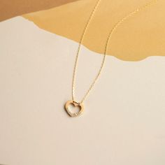 "We know every love is precious and unique, just as the ones that you love more than yourself. But, your loved ones need to know this as well. Best way to show your love is our open heart diamond necklace! F E A T U R E S * Made to Order. * Gold KT: 14K * Choice of Gold Color: Yellow Gold, Rose Gold, White Gold * Gem Stone: Genuine Diamond * Diamond-Cut: Round * Diamond Carat: 0.02 ct * Pendant Height: 8 mm / 0.31 inch * Pendant Width: 10 mm / 0.39 inch * Diamond Color-Clarity: H Color, SI Clari Affordable Dainty Open Heart Necklace, Gold Jewelry Gift, Gold Heart Pendant, Open Heart Necklace, Real Gold Jewelry, Heart Necklace Diamond, Solid Gold Necklace, Heart Pendant Gold, Gold Diamond Necklace