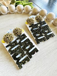 "Beautiful laser cut acrylic Purdue earrings with cute seed bead pom pom topper! Perfect statement earrings for Purdue game days! Be sure to check out all of my other listings for Purdue earrings. Boiler Up! FREE SHIPPING on all orders $35+, discount automatically applied at checkout! LOCALS: If you would like to pick your order up from my home in Oxford, Indiana - please use code \"LOCALPICKUP\" to eliminate the shipping charge. {Proud to be Officially Licensed as a Purdue Craft Vendor} MATERIA Craft Vendor, Juneteenth Earrings, Pilot Wife, Airforce Wife, Fall White, Peacock Earrings, Farmer Wife, Black Seed, Pumpkin Earrings