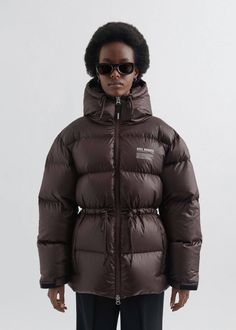 The Rhode jacket is crafted from recycled shell and filled with repurposed down. It’s designed with drawstring ties at the waist, so that you can personalize the fit of the quilted silhouette.

The model is 176cm/ 5'8 ft and wears a size S. Best Puffer Jacket, Axel Arigato, Jacket Fits, Puffer Jacket Women, S Logo, Women's Wear, Down Vest, Womens Bras, Bra Women