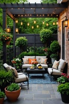 an outdoor patio with seating and potted plants