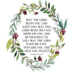 a wreath with leaves and flowers around it that says, may the lord blessing you and keep