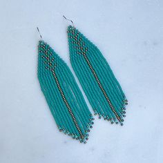 Turquoise and Silver Beaded Fringe Earrings, Blue/green Bohemian Beaded Tassel Earrings - Etsy Elegant Turquoise Tassel Fringe Earrings, Elegant Turquoise Tassel Earrings With Fringe, Blue Bohemian Beaded Fringe Tassel Earrings, Elegant Turquoise Earrings With Fringe, Turquoise Fringe Tassel Drop Earrings, Bohemian Turquoise Tassel Earrings, Turquoise Beaded Fringe Tassel Earrings For Festival, Turquoise Tassel Earrings With Colorful Beads For Festival, Turquoise Fringe Beaded Earrings For Festival