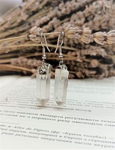 Clear Quartz Crystal Earrings April Birthstone Jewelry with Clear Quartz Crystal Hypoallergenic stainless steel earrings Unique Bohemian Elegant Dangle Drop Earrings Already neatly packed in a kraft gift box - ready to give to her, your beloved one. Perfect gift for her Stainless Steel Hook Earrings Silver or Gold color Crystal Size 20-30 mm    For any questions, do not hesitate to contact me. Crystal Long Drop Earrings As Gift, Crystal Long Drop Earrings For Gifts, Silver Dangle Mineral Crystal Jewelry, Silver Dangle Jewelry With Mineral Crystal, Silver Minimalist Earrings With Natural Stones, Nickel-free White Crystal Metal Earrings, Nickel-free White Metal Crystal Earrings, Silver Crystal Dangle Earrings With Natural Stones, Long Drop Crystal Earrings For Gift