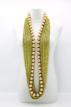 Jianhui London 10 strands lime pashmina necklace with hand painted recycled wood 5 x 5 mm wooden square beads and 1 strand  gold 22mm round wooden beads necklace. Jewellery for spring outfit. Jewellery for older woman. Gold Multi-strand Jewelry With Wooden Beads, Multi-strand Gold Jewelry With Wooden Beads, Multi-strand Wooden Beads For Jewelry Making, Wooden Multi-strand Beads For Jewelry Making, Elegant Green Beaded Necklaces With Wooden Beads, Elegant Green Wooden Beaded Necklaces, Elegant Green Beaded Necklace With Wooden Beads, Elegant Multi-strand Necklaces With Wooden Beads, Elegant Multi-strand Necklace With Wooden Beads