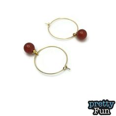 "Stainless Steel Gold Hoop with Carnelian Earrings 1 3/8 inches in length 1\" wide Earwire: Gold-plated Stainless Steel Nickel free Enjoy." Carnelian Round Earrings With Ear Wire, Round Agate Ear Wire Jewelry, Round Agate Jewelry With Ear Wire, Carnelian Earrings, Gold Hoop, Jewelry Earrings Dangle, Etsy Earrings, Dangle Drop Earrings, Dangle Earrings