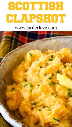 a bowl filled with mashed potatoes on top of a table