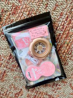 a package with some pink items inside of it