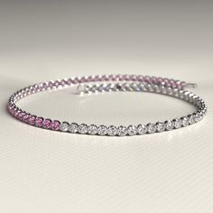 Add a touch of elegance to your wrist with our Diamond & Natural Pink Sapphire Custom 50-50 Tennis Bracelet. Handmade with love, this stunning piece features lab-grown diamonds, creating a luxurious sparkle. Perfect as a Christmas gift or for any special occasion. Don't miss out on our Cyber Sale. Order now!𝐅𝐞𝐚𝐭𝐮𝐫𝐞𝐬:• 𝐌𝐚𝐝𝐞 𝐭𝐨 𝐎𝐫𝐝𝐞𝐫• 𝐌𝐞𝐭𝐚𝐥: 𝟏𝟒𝐊 | 𝟏𝟖𝐊• 𝐁𝐚𝐧𝐝 𝐂𝐨𝐥𝐨𝐫𝐬: Rose Gold, Yellow Gold & White Gold• 𝐂𝐮𝐬𝐭𝐨𝐦 𝐂𝐫𝐨𝐜𝐨𝐝𝐢𝐥𝐞 𝐋𝐨𝐜𝐤𝐒𝐭𝐨𝐧𝐞:• 𝐒𝐭 Cubic Zirconia Bracelets For Anniversary Fine Jewelry, Fine Jewelry Cubic Zirconia Bracelets For Anniversary, Cubic Zirconia Bracelets For Anniversary, Diamond White Jubilee Tennis Bracelet For Anniversary, White Gold Jubilee Tennis Bracelet For Anniversary, Flexible Cubic Zirconia Diamond Bracelet, Adjustable Brilliant Cut Round Tennis Bracelet, Adjustable Brilliant Cut Tennis Bracelet, Fine Jewelry Tennis Bangle Bracelet For Anniversary