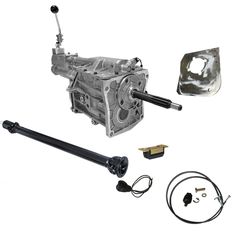 an engine and parts for a car on a white background