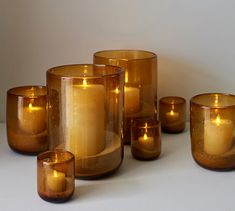 a group of candles sitting next to each other