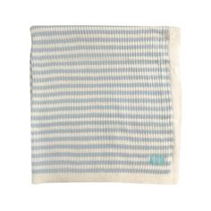 a blue and white striped blanket on a white background