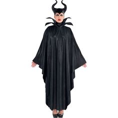 a woman wearing a black costume with horns