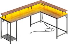 a computer desk with a yellow light in the middle and an electrical cord connected to it