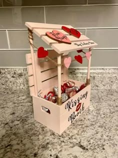 a valentine's day treat box with candy in it