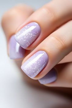 lavender nails, pastel nails, lavender nail design, pastel nail ideas, beautiful nails, trendy nail colors, nail inspiration, nail art, nail trends, nail goals, nail aesthetics, chic nails, feminine nails, nail inspo, nail vibes, nail styles, nail beauty, lavender manicure, pretty nail designs, lavender beauty, nail perfection, pastel hues, nail creativity, stunning nails, lavender elegance Lavender And Glitter Nails, Lilac Sparkle Nails, Lavender Winter Nails, Purple Bridal Nails, Sheer Lavender Nails, Lavender Sparkle Nails, Lavender Wedding Nails, Classy Purple Nails, Light Lavender Nails