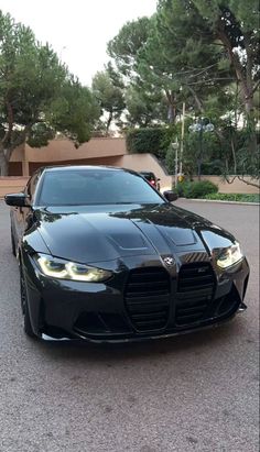 a black sports car parked on the street