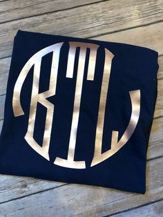 "Y'all this rose gold vinyl is so hard to photograph, but if you love the color, you're going to love this shirt! This shirt is available on a long sleeve, short sleeve shirt, or tank top comfort colors brand. It will come on a navy T-shirt with rose gold vinyl! In the notes to seller please leave: 1. Monogram (in the order you would like it to appear) 2. Font style. The font shown is also available just say \"font shown\"" Vinyl Monogram, Maroon Shirts, Comfort Colors Tshirt, Monogram Shirts, Cactus Design, Gold Vinyl, Gold Lettering, Vinyl Shirts, Gold Letters