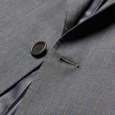 NEW Marked EU Size: 54 US Size: 44 R7 Drop - Regular Fit Gray Striped 100% Wool Super 130's Three Button Closure Fully Lined Double Vented Unfinished Sleeve Buttonholes (Buttons Included) Flap Pockets Notch Lapel Flat Front Pants Made In Italy Jacket Measurements: Shoulder: (seam to seam) 18.5" Jacket Length: 30.5" Sleeve Length (top of the shoulder seam to the edge of the vented side of the sleeve): 26" Chest: 45" Waist: 42.5" Pants Measurements: Waist: 37.5" Additional Fabric To Expand Waist 1 Timeless Fitted Suits With Buttons, Luxury Fitted Suits With Button Closure, Timeless Tailored Suits With Button Closure, Tailored Suits With Button Closure For Office, Timeless Suits With Button Closure And Suit Collar, Timeless Tailored Suits, Designer Business Suits With Button Closure, Elegant Three-piece Suit With Buttons For Office, Luxury Tailored Suits With Button Closure