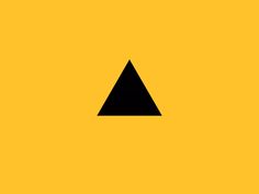 a black triangle on a yellow background