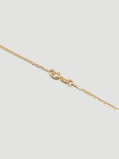 DESCRIPTIONA simple, flat chain that truly glistens when the light hits due to the flat links. A dainty statement necklace made to add a little flair to your everyday outfits. DETAILS - always made in 14k gold - chain width: 1.3mm- model wears a 16" 14k Yellow Gold Bar Necklace With Delicate Chain, Minimalist Gold Plated Chain Necklace With Rectangular Links, Dainty 14k Gold Necklace With Rectangular Links, Yellow Gold Necklaces With Oval Link Box Chain, Timeless Yellow Gold Necklace With Figaro Chain, Minimalist 14k Gold Cable Chain Necklace, Yellow Gold Necklace With Oval Link Box Chain, 14k Gold Box Chain Necklace With Rectangular Links, 14k Yellow Gold Box Chain Necklace