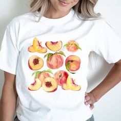 Peach Trendy Crewneck cottagecore shirt Graphic Tees For Women fruit tshirt comfort colors gift for foodie Trending Fruit Shirt Please message us if you want your t-shirt in one of the additional colors or a sweatshirt.  Comfort Colors garment-dyed t-shirt made 100% with ring-spun cotton. The soft-washed, garment-dyed fabric brings extra coziness to your wardrobe while the relaxed fit makes it an excellent daily choice.  Please keep in mind that the design is scaled down for smaller t-shirt sizes. T-SHIRT CARE INSTRUCTIONS: Machine wash cold Wash inside-out, with similar colors Tumble dry low. Hang-dry for longer life Cool iron inside-out. Do not use bleach Do not iron directly on the print Do not dry-clean Thank you for supporting our small business! Please visit our shop https://www.etsy Peaches Graphic, Fruit Shirt, Vintage Clipart, Baby Graphic Tees, Y2k Baby Tee, Y2k Clothing, Fruit Print, Baby T Shirts, Trendy Tops