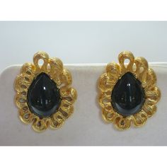 1970's Givenchy gold-plated carved ribbon & glass cabochon black amethyst comfort clip back earrings. Signed :"Givenchy, Paris, New York". From my private collection, never worn. I have been collecting vintage high end designer name brand costume jewelry for over 40 years, primarily "Givenchy" & "Karl Lagerfeld". All my jewelry is kept in a secure protected environment ...hence the Excellent condition.  Enjoy your Gorgeous earrings in the "best of Health" Pristine...     Due to the unique nature Black Cabochon Earrings For Evening, Evening Black Cabochon Earrings, Luxury Metal Clip-on Earrings For Evening, Gold Cabochon Clip-on Earrings For Party, Black Amethyst, Givenchy Paris, Your Gorgeous, Designer Name, Unique Nature