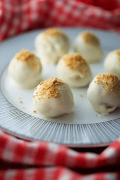 small desserts on a plate with red and white checkered cloth