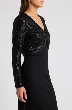 Sequins sparkle under the lights on a long-sleeve bolero that will add old Hollywood glamour to your evening look. Front hook-and-eye closures V-neck Long sleeves 95% polyester, 5% spandex Hand wash, line dry Imported Elegant Fitted V-neck Shrug, Winter Party Fitted Shrug, Elegant Winter Shrug For Night Out, Chic Fitted Evening Shrug, Chic Fitted Shrug For Evening, Fitted Evening Shrug For Fall, Elegant V-neck Fitted Shrug, Elegant Party Shrug For Fall, Winter Evening Fitted Shrug