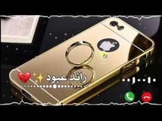 an image of a gold phone with arabic writing on the front and back cover,