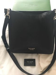 This Kate Spade Roulette Pebbled Medium black crossbody handbag is the perfect addition to any wardrobe. With its sleek design and high-quality leather exterior, this bag is sure to turn heads. The bag features a solid pattern and comes with a black handle/strap that complements the overall look of the bag. The interior lining is also black, which adds to the sophisticated look of the bag. This handbag is part of the Kate Spade New York Cat product line. It is an excellent choice for anyone looking for a stylish and functional accessory. Whether you're running errands or heading out for a night on the town, this bag is sure to impress. New with box, storage bag, and tag. Suggested retail $250.00 Luxury Kate Spade Bags With Leather Lining, Luxury Kate Spade Shoulder Bag With Detachable Handle, Luxury Kate Spade Top Handle Shoulder Bag, Kate Spade Black Top Handle Shoulder Bag, Kate Spade Black Bag For Daily Use, Kate Spade Black Bag With Card Slots, Kate Spade Black Bag With Zipper Closure, Kate Spade Black Bag With Gold-tone Hardware, Box Storage