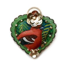 Bird with blossom heart pendant
 	Materials: Copper and vitreous enamel, tin, sterling silver
 	Handmade item
 	Scalloped heart is 1.5" in diameter
 	One-of-a-kind
 	Can be worn as a pendant or brooch
 	Style: Nature lover
 	Can be personalized: No Unique Heart-shaped Jewelry Brooch, Brooch Style, Elizabeth Jewelry, Vitreous Enamel, Red Bird, Bird Brooch, Puffy Heart, Red Birds, Heart Jewelry